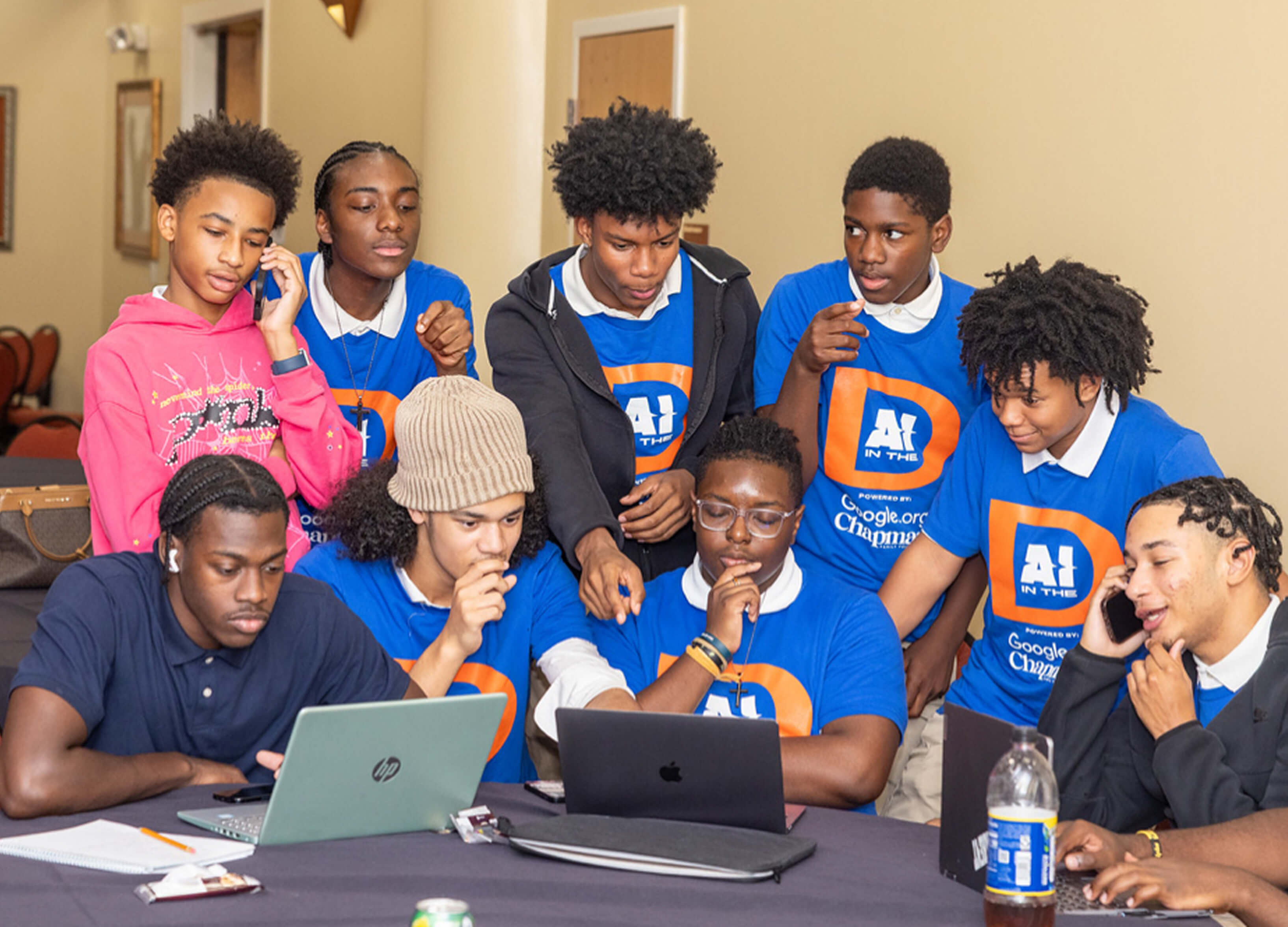 Detroit students exploring AI tools at an AI in the D program session