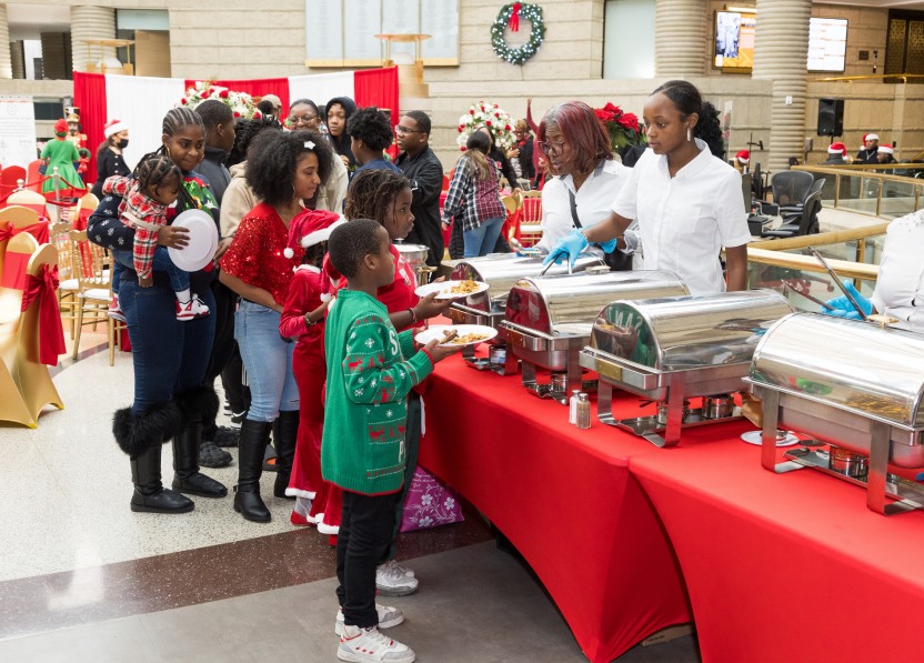Families lining up at the breakfast buffet
