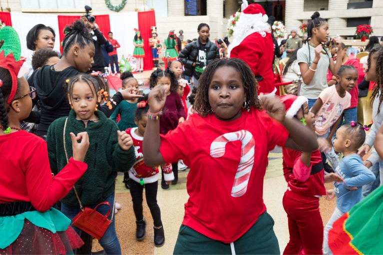 Children dancing and laughing at the celebration